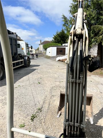 Driveway groundworks with an excavator in view