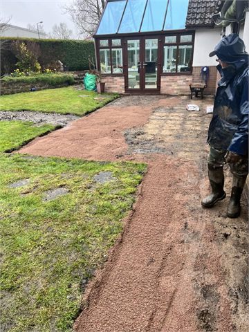 Patio ground preparation beside a conservatory